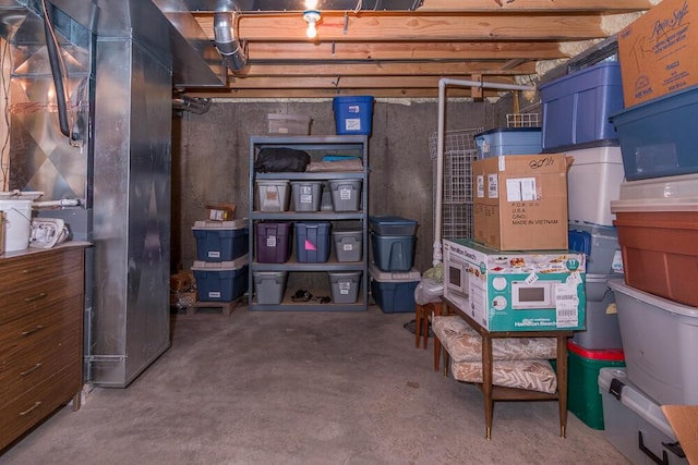 storage room featuring heating unit