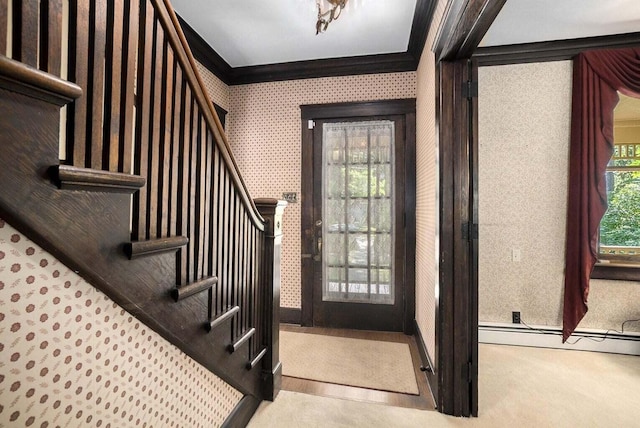 foyer entrance featuring crown molding, light carpet, and a baseboard heating unit