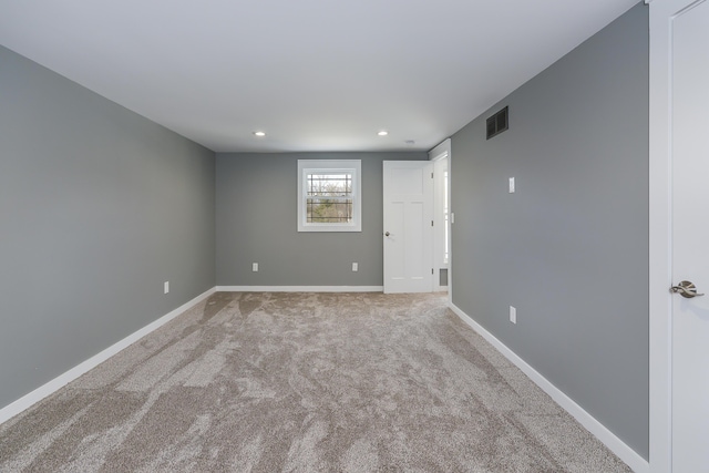 spare room with carpet floors