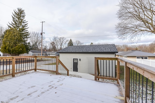 view of snow covered deck