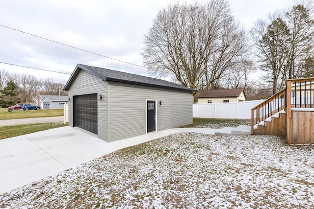 view of snow covered garage