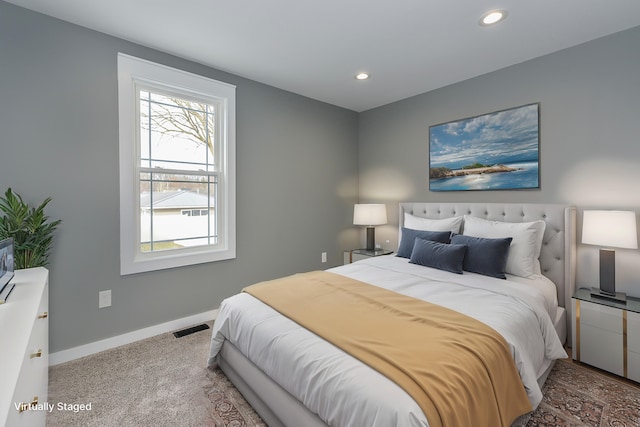 bedroom with baseboards, visible vents, carpet flooring, and recessed lighting