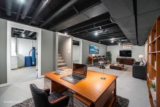 office space featuring concrete floors