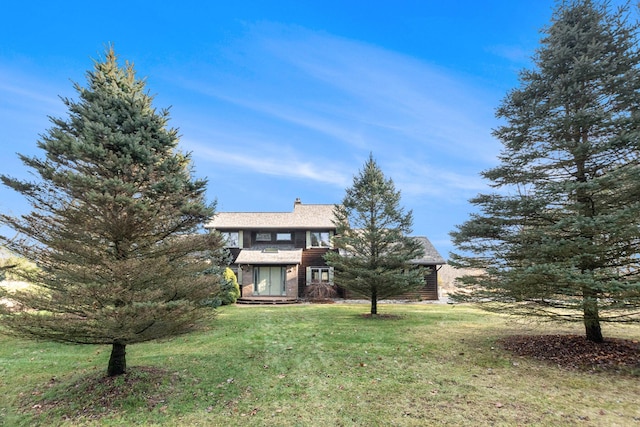 exterior space with a front yard