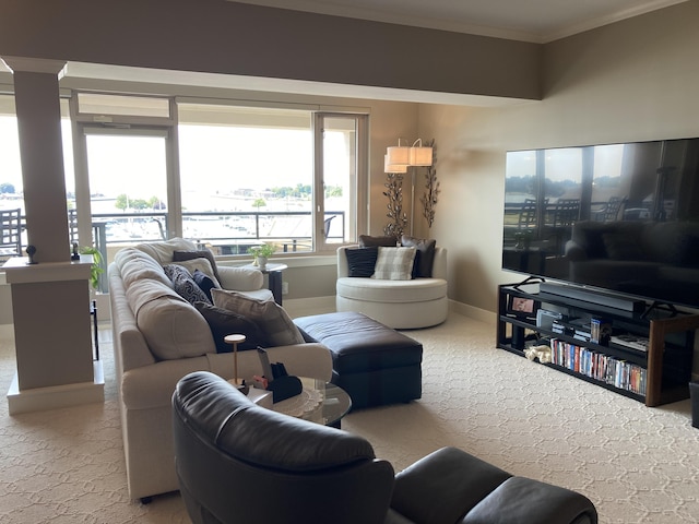 carpeted living room with crown molding