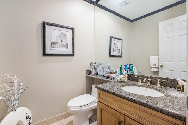 bathroom with tile patterned floors, vanity, and toilet