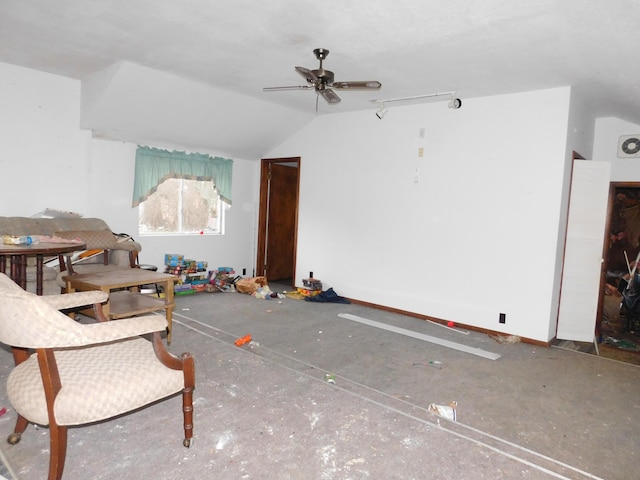 interior space with vaulted ceiling and ceiling fan