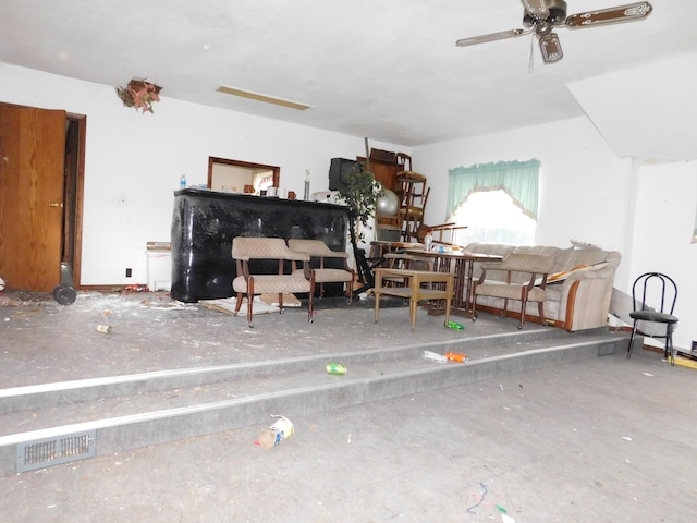 living room featuring ceiling fan