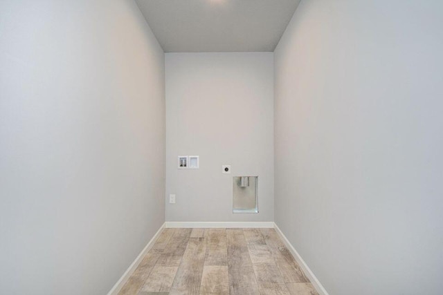 laundry room featuring washer hookup, electric dryer hookup, and light wood-type flooring