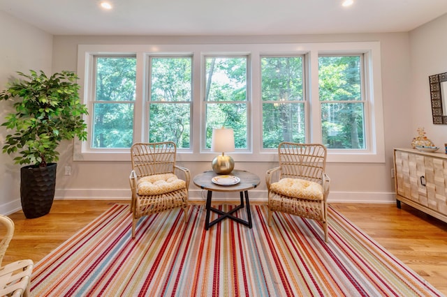 sitting room with a healthy amount of sunlight and light wood-type flooring