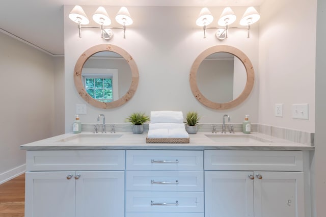 bathroom featuring vanity and wood-type flooring