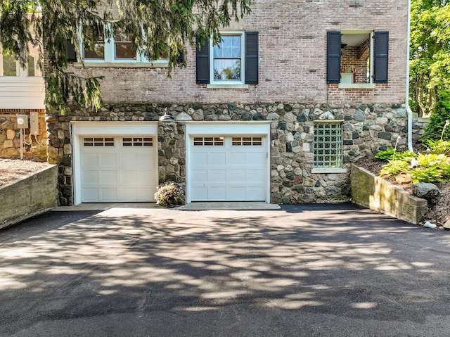 exterior space with a garage