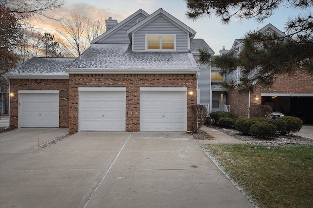 view of front of property with a garage