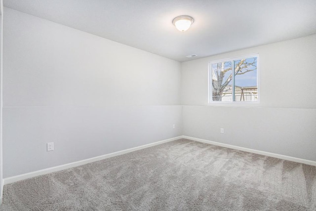 view of carpeted spare room