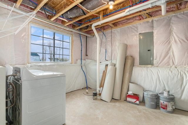 basement featuring electric panel and independent washer and dryer