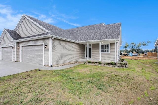 single story home with a garage and a front yard