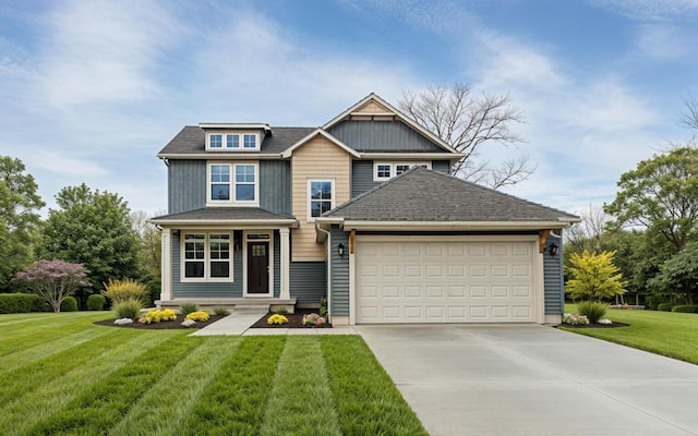 view of front facade with a garage and a front yard