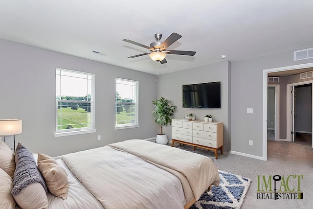 bedroom featuring ceiling fan and carpet