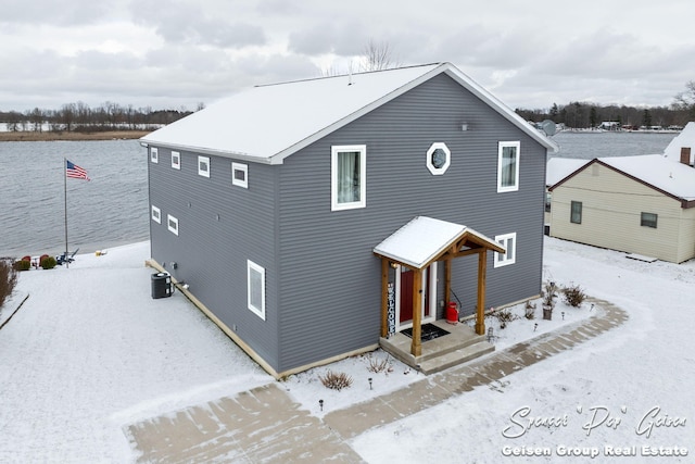 view of front of house with central AC unit