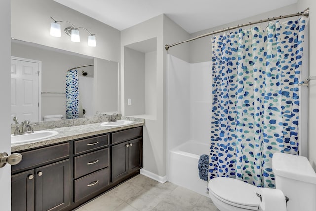 full bathroom with vanity, toilet, and shower / tub combo with curtain