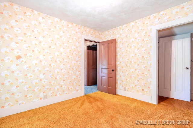 unfurnished bedroom featuring carpet floors