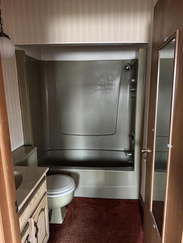 full bathroom with toilet,  shower combination, and vanity