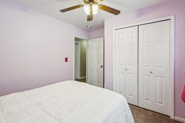 carpeted bedroom with a closet and ceiling fan