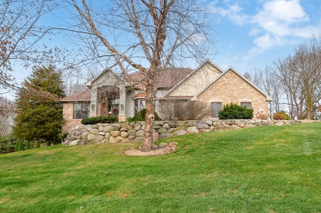 view of front of home with a front yard