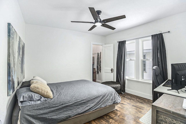 bedroom featuring ceiling fan and dark hardwood / wood-style floors