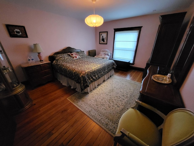 bedroom featuring hardwood / wood-style floors