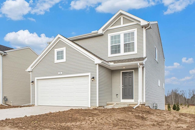 front of property with a garage