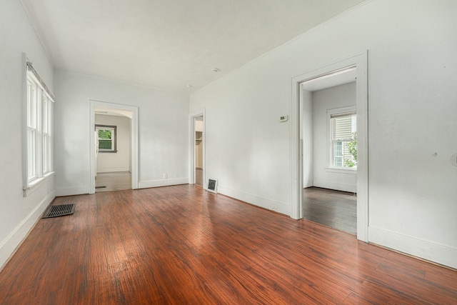 empty room featuring dark hardwood / wood-style floors