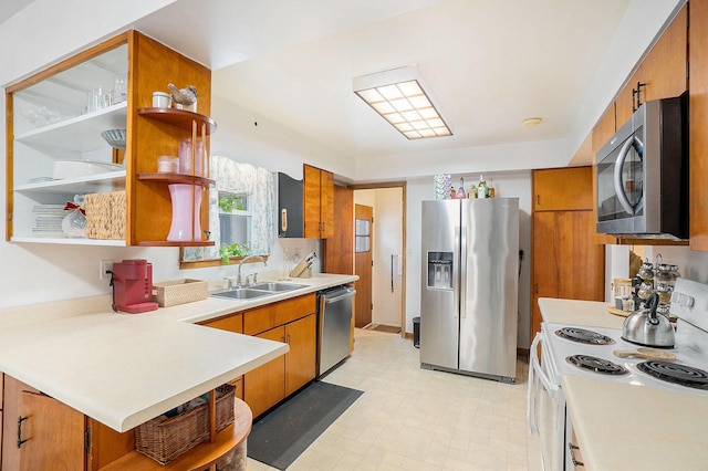 kitchen with sink and appliances with stainless steel finishes