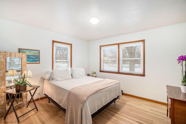 bedroom with light hardwood / wood-style floors