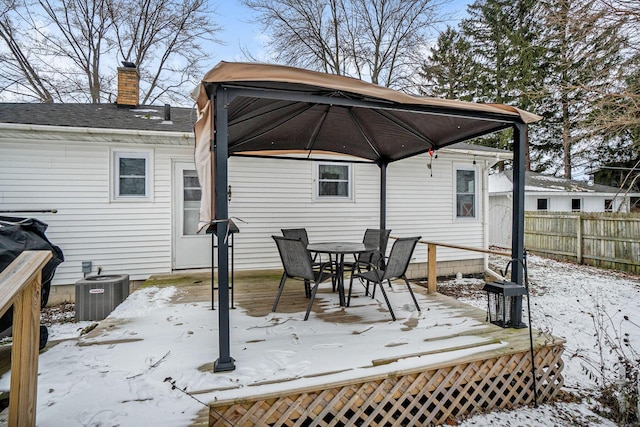 snow covered deck with central AC