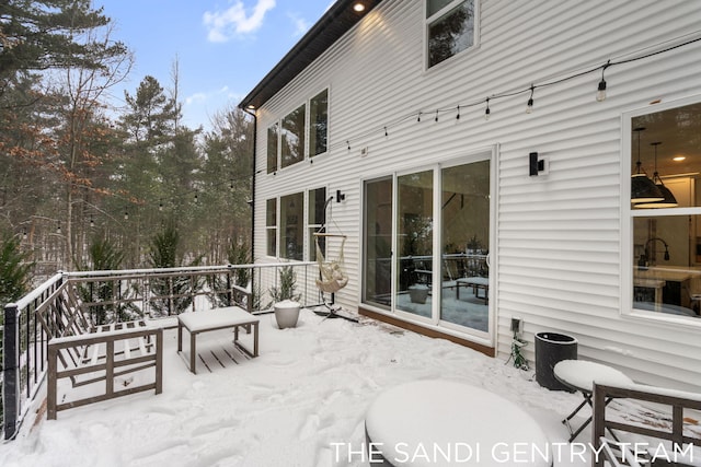 view of snow covered patio