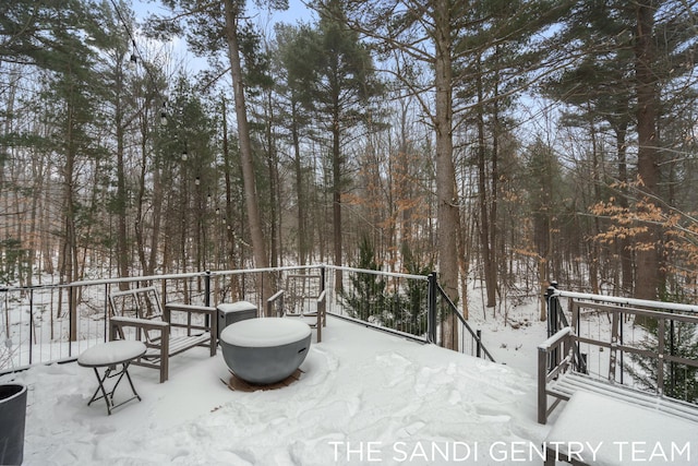 view of snow covered deck