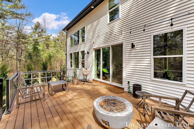 16500 Haven Woods Ct, West Olive, MI 49460 - deck with a fire pit