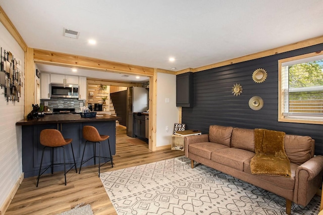 living room featuring light hardwood / wood-style flooring