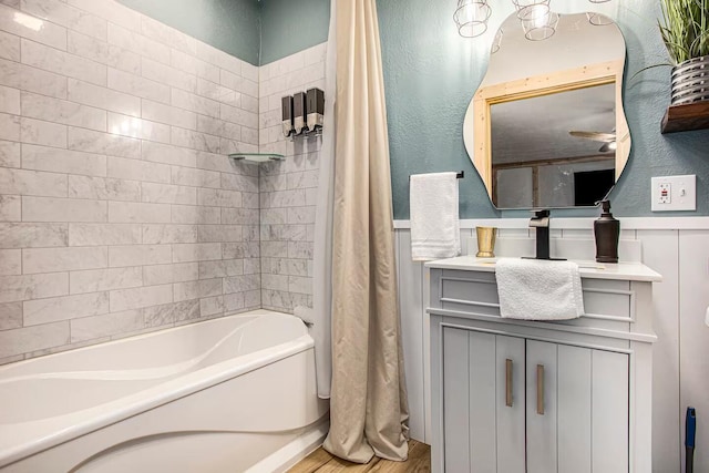 bathroom featuring vanity and shower / bath combo