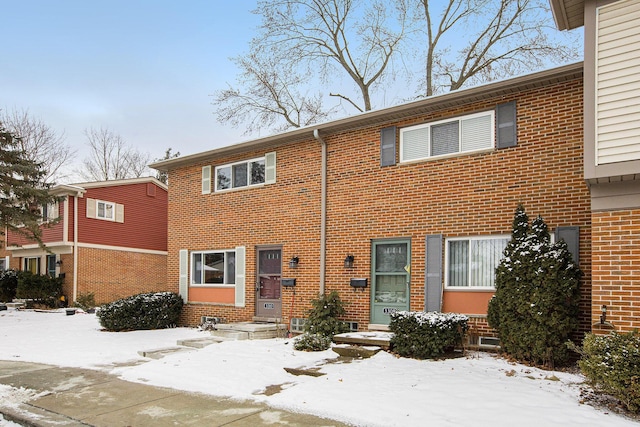 view of snow covered property