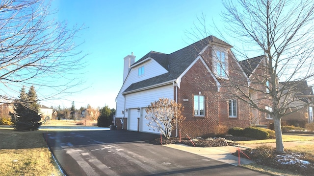 view of home's exterior featuring a garage