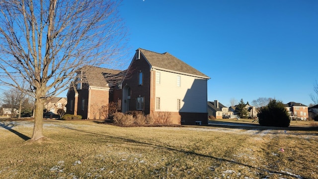 view of property exterior featuring a yard