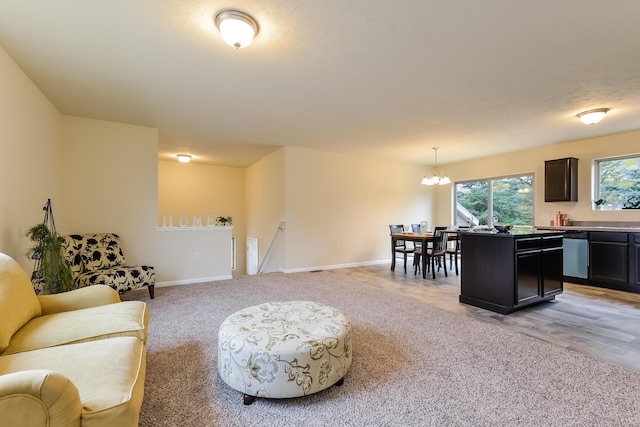 living room featuring a chandelier