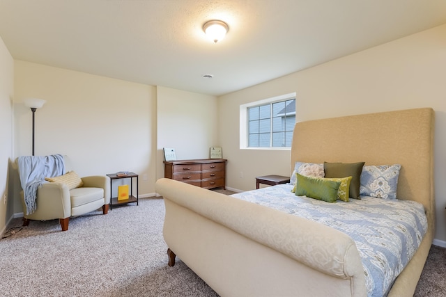 bedroom featuring carpet