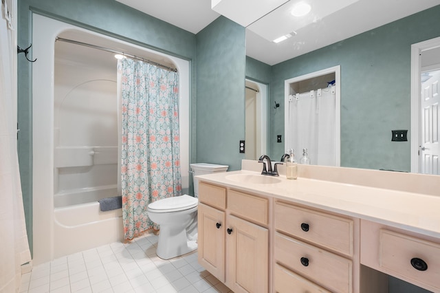bathroom featuring toilet, shower / bath combo, tile patterned flooring, and vanity
