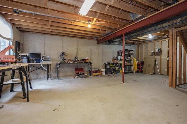 basement with a workshop area