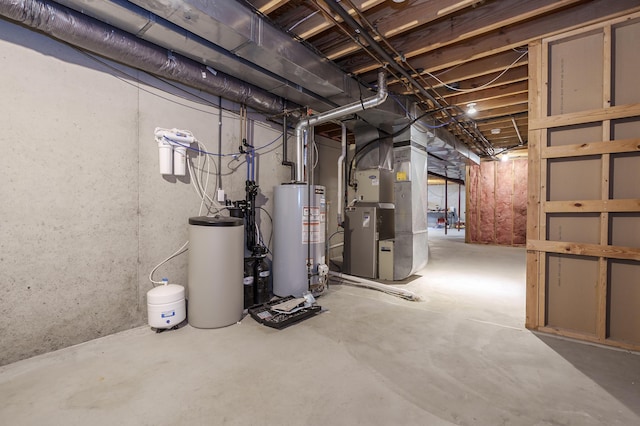 unfinished below grade area with gas water heater and heating unit