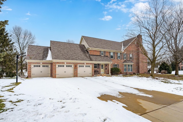 view of front of house featuring a garage, brick siding, and a chimney