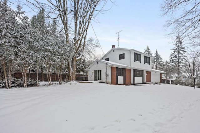 view of snow covered property